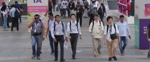 A vibrant flow of visitors, buyers, and industry professionals across the exhibition halls at Bharat Tex 2026, reflecting the event's strong international participation.
